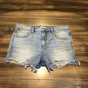 Free People distressed denim shorts